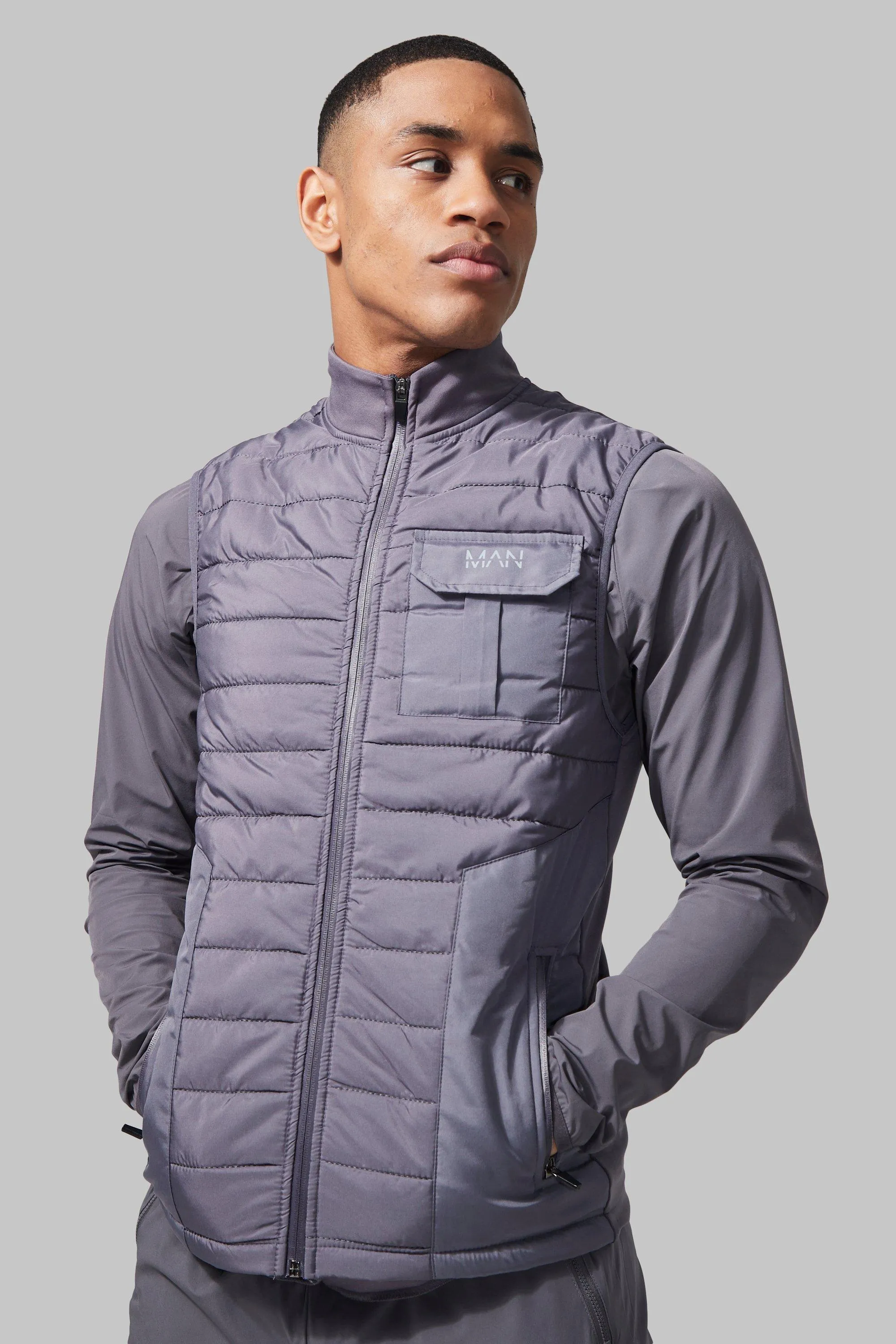 Man Active Cargo Pocket Body Warmer | boohooMAN UK